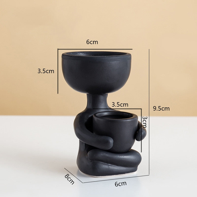 sitting plant pot Levittown Clay Pot Planter Orren Ellis Color: Black, Size: 3.9